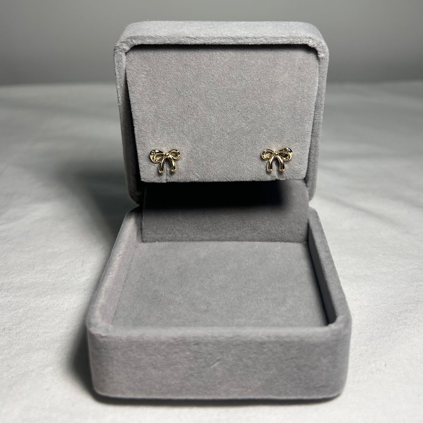 Aretes Moño